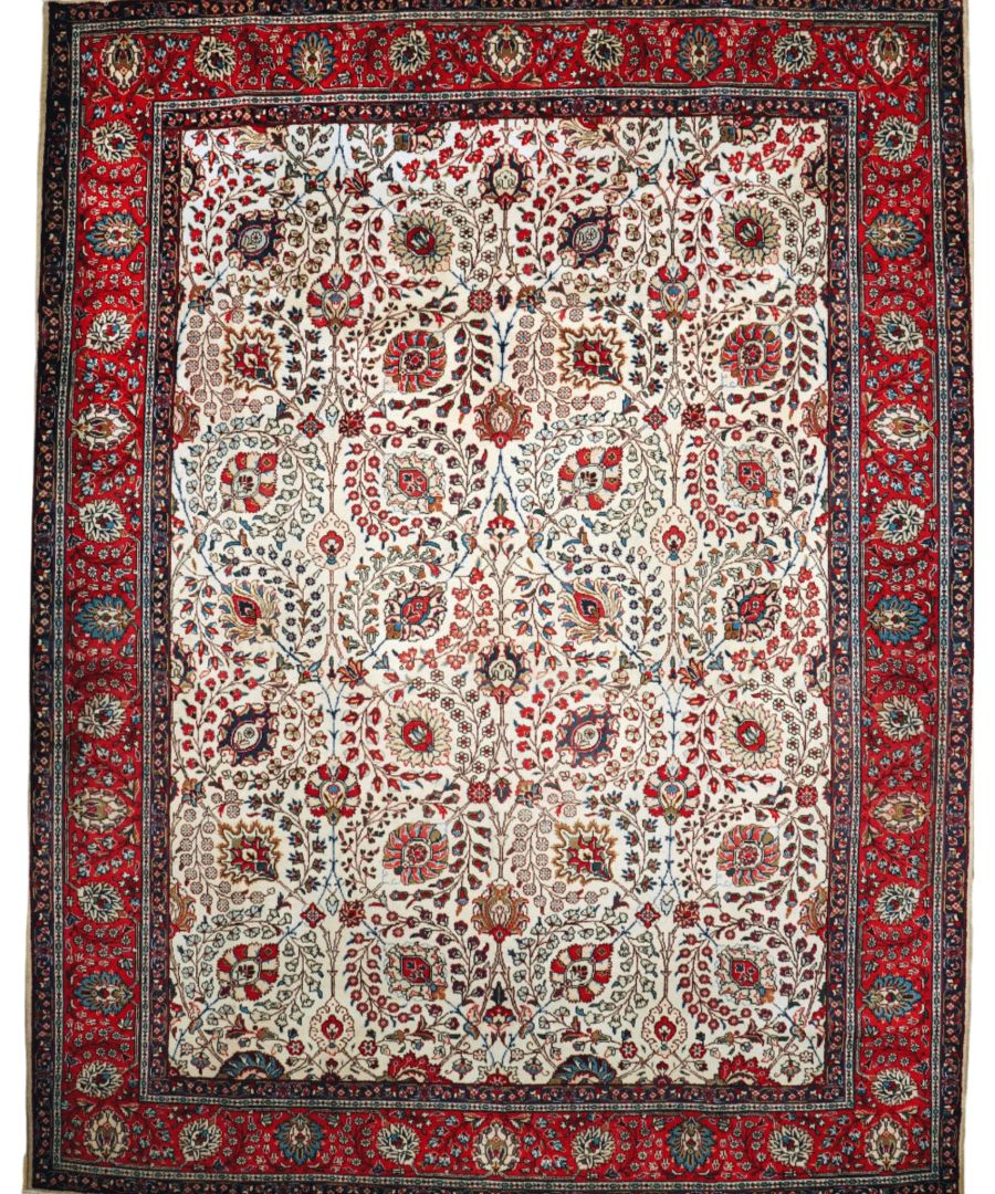 Square area rug with cream field, red medallion pattern, and dark navy outer border.