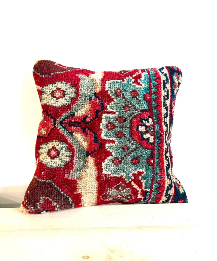16x16 square decorative pillow with red, teal, and cream geometric patterned fabric