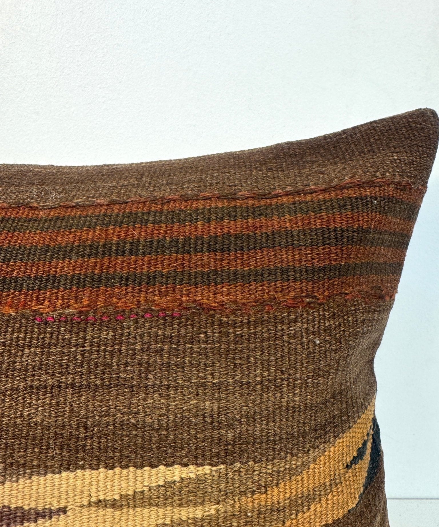 Woven pillow, 16 x 16 in, brown with orange and yellow horizontal stripes