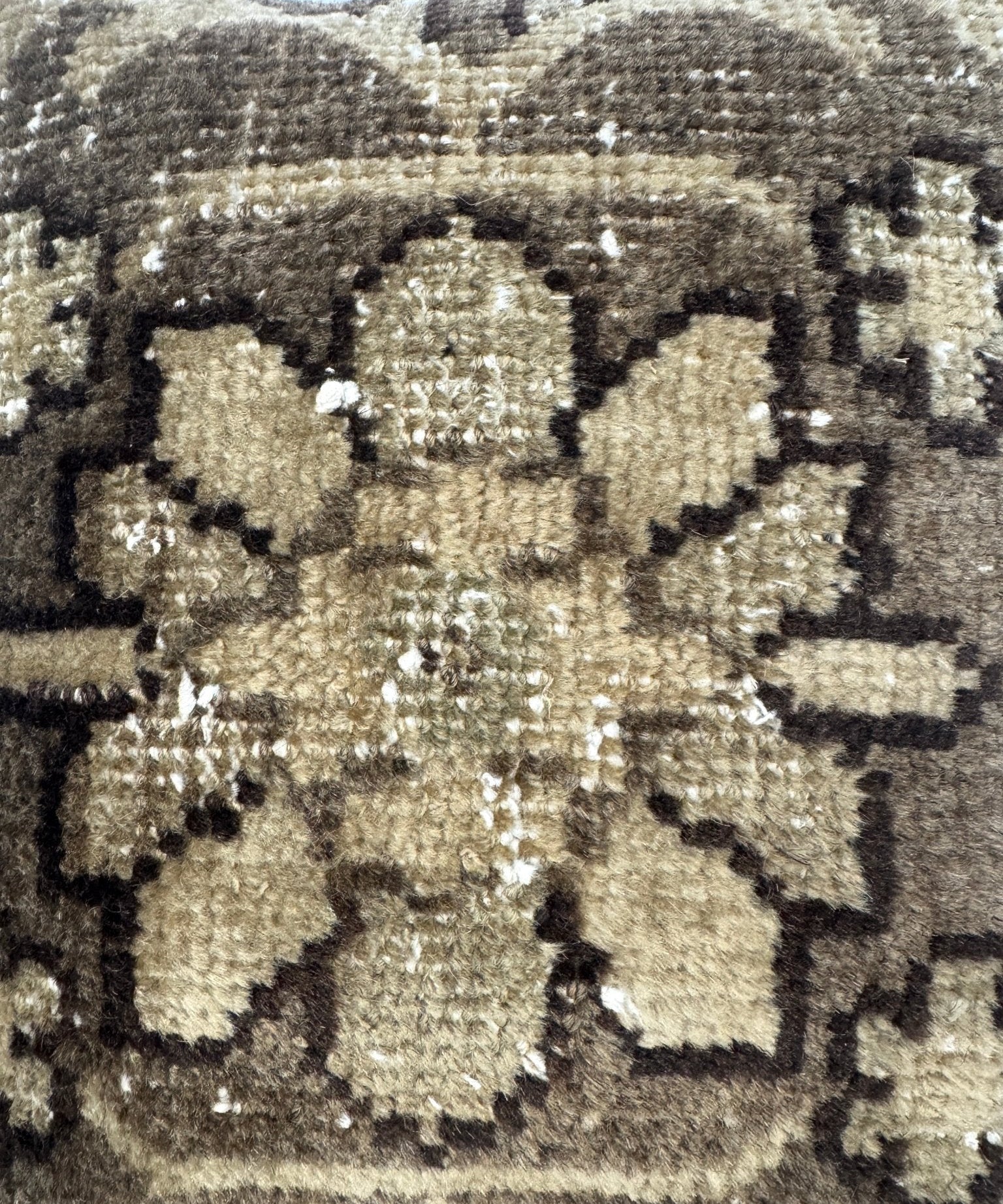 Gold and dark geometric floral pattern on square throw pillow