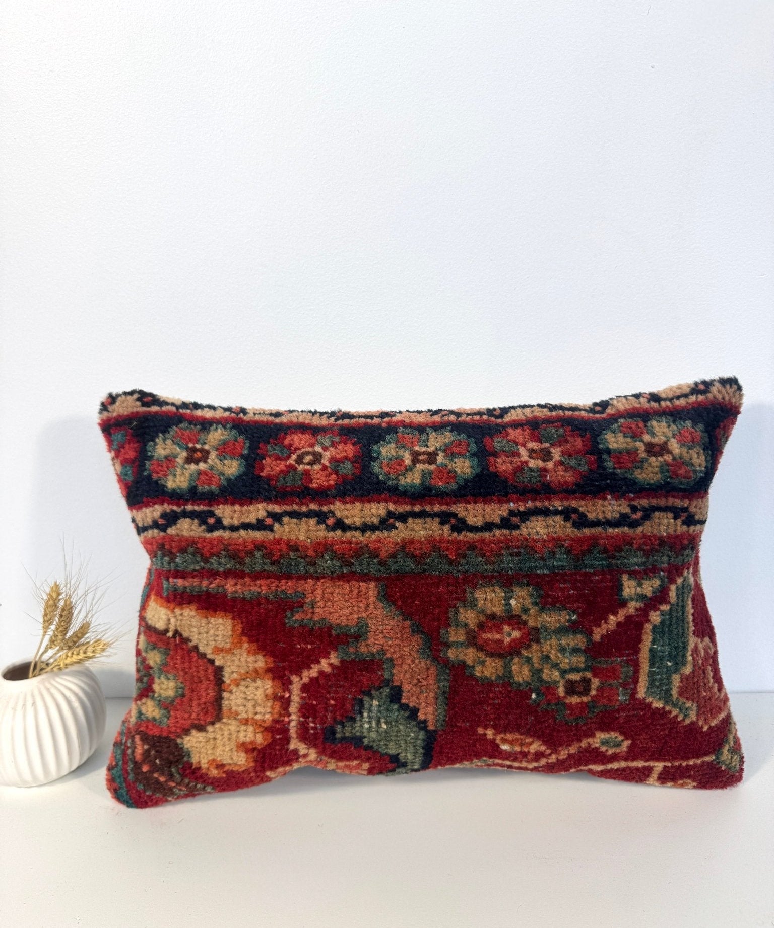 Multicolor rectangular pillow cover with patterned front and woven border trim