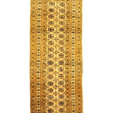 Afghan Bokhara runner rug full view in gold with black medallion column and border