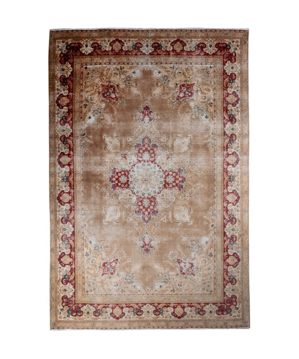 Ivory Tabriz-style area rug with red and blue corner ornaments and center medallion.