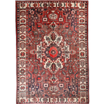 Persian Bakhtiar rug full view with red field, cream border, and ornate geometric center