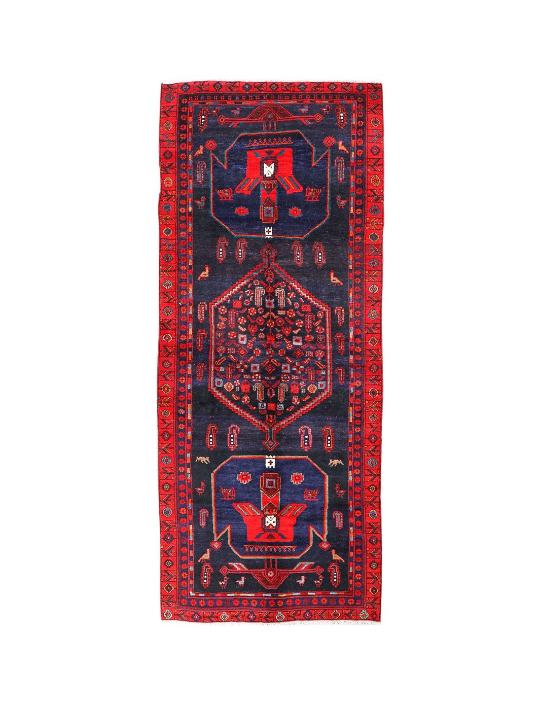 Kurdish Koliai rug, dark navy field with red border and central geometric medallion.