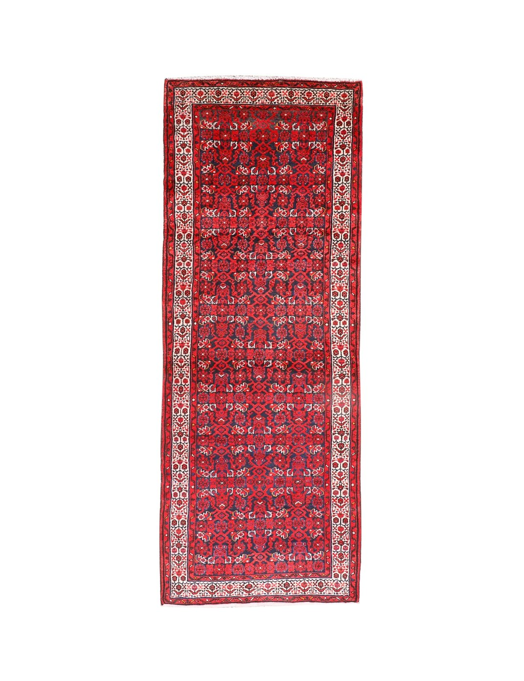 Persian runner rug studio view with dark red central motif, cream frame, and thin fringe.