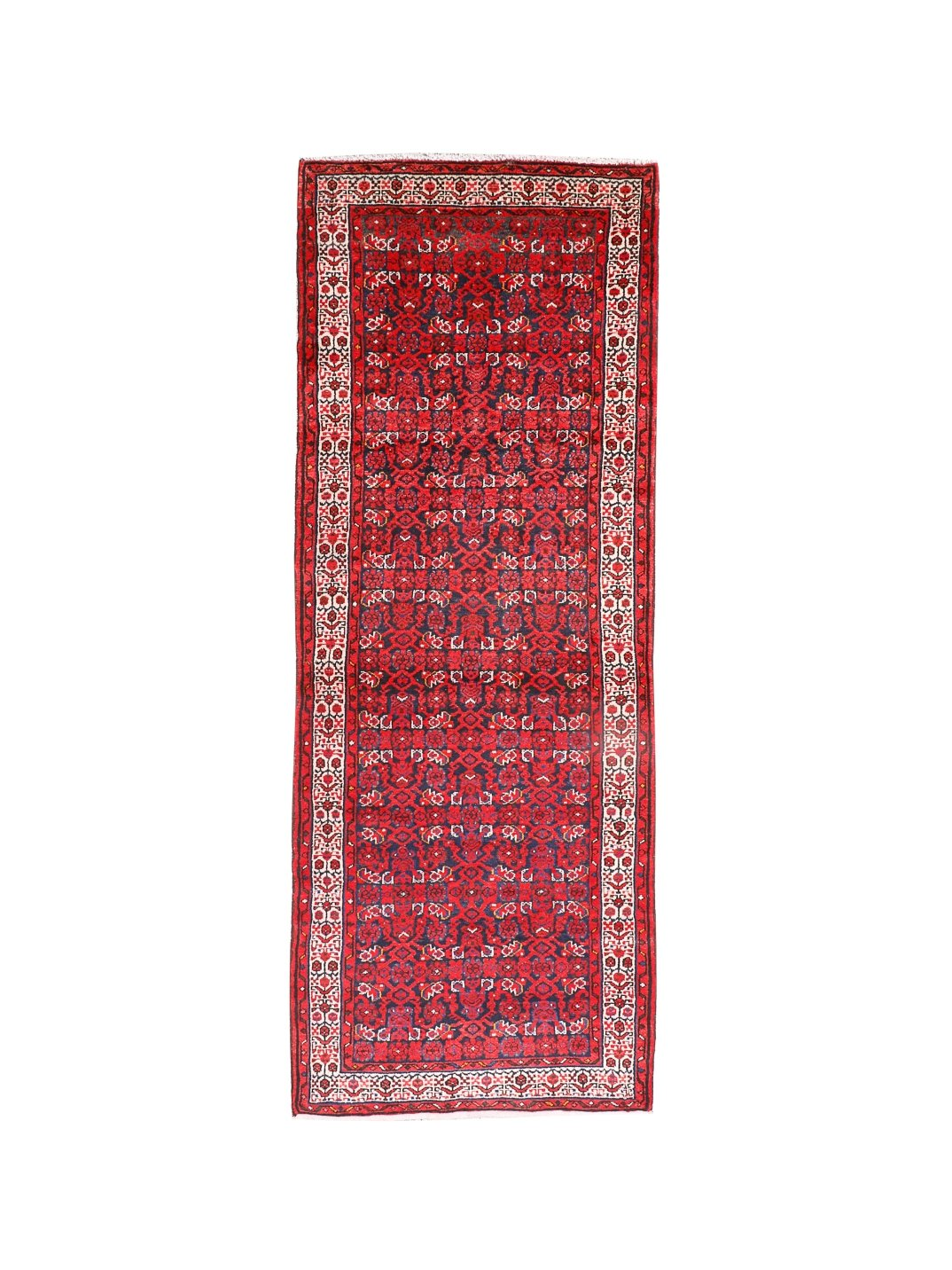 Persian runner rug studio view with dark red central motif, cream frame, and thin fringe.