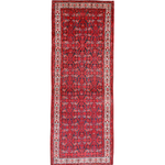Persian runner rug studio view with dark red central motif, cream frame, and thin fringe.