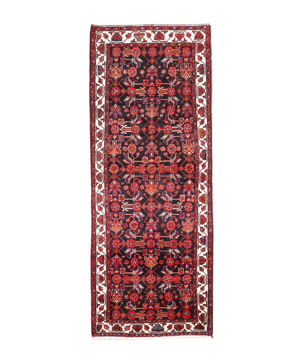 Persian runner rug with dark red medallion pattern, black field, cream border stripes
