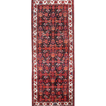 Persian runner rug with dark red medallion pattern, black field, cream border stripes