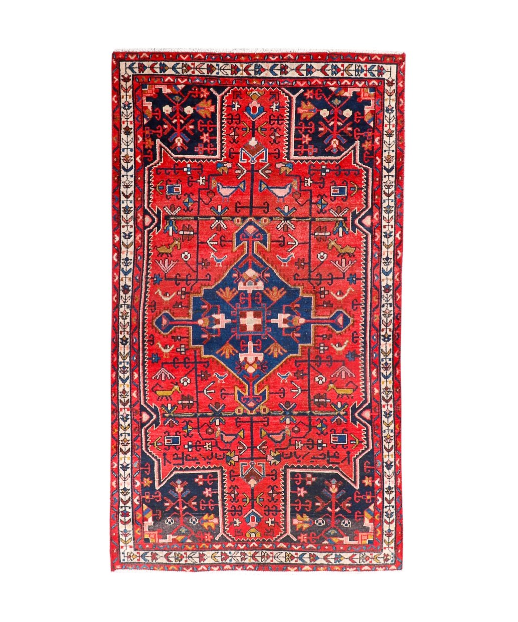 Tuyserkan Persian rug with red field, navy medallion, and cream geometric border