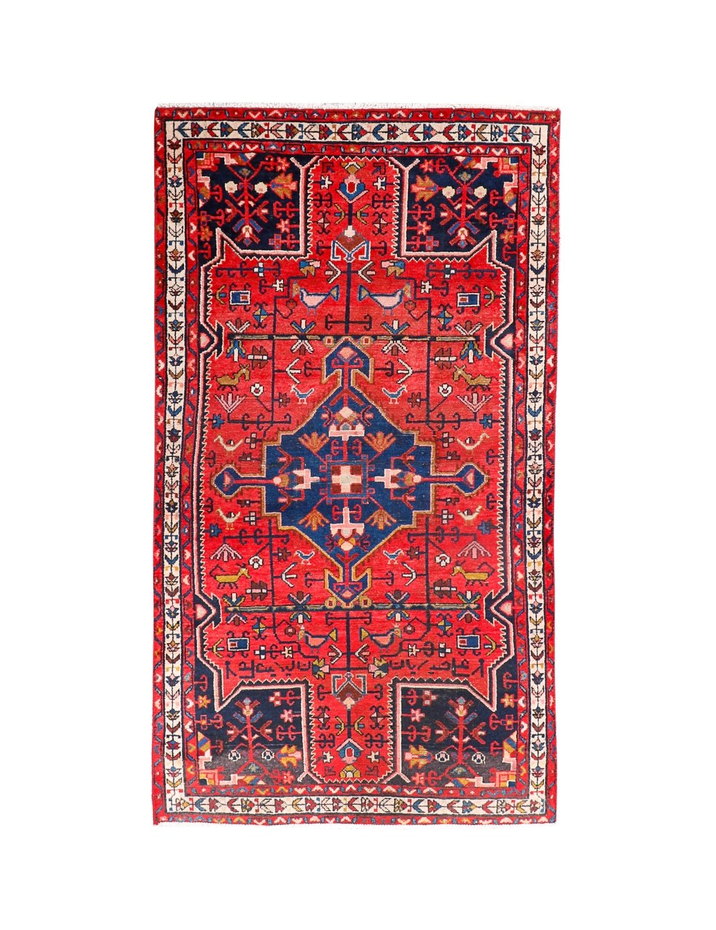 Tuyserkan Persian rug with red field, navy medallion, and cream geometric border