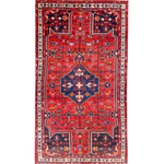 Tuyserkan Persian rug with red field, navy medallion, and cream geometric border