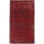Persian Baluch rug with red field and black geometric medallion pattern, border trim