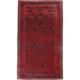 Persian Baluch rug with red field and black geometric medallion pattern, border trim