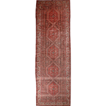 Persian Hamedan runner rug with red field, central medallions, and ornate geometric border.