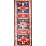 Persian runner rug with navy field, red border, and geometric medallion motifs.