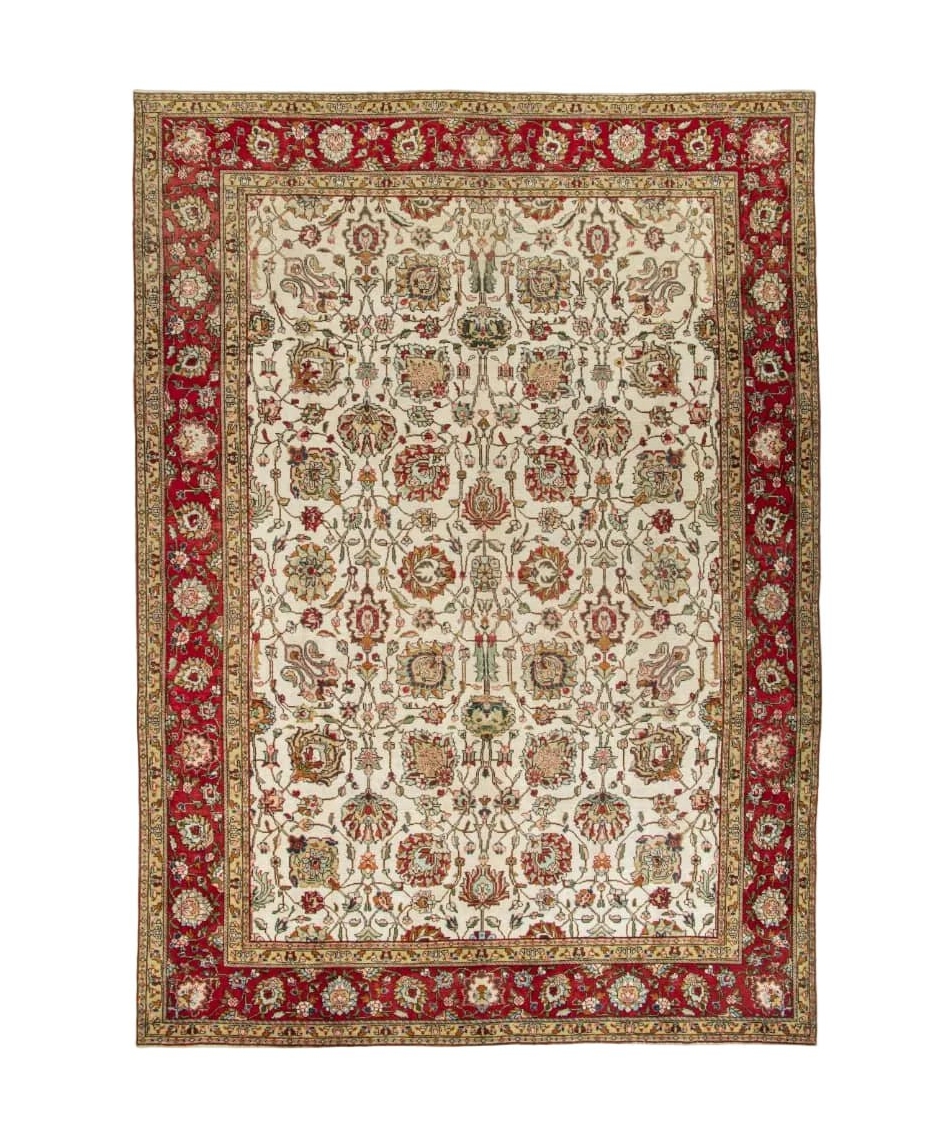 Persian Tabriz rug, full view with red border and beige medallion pattern