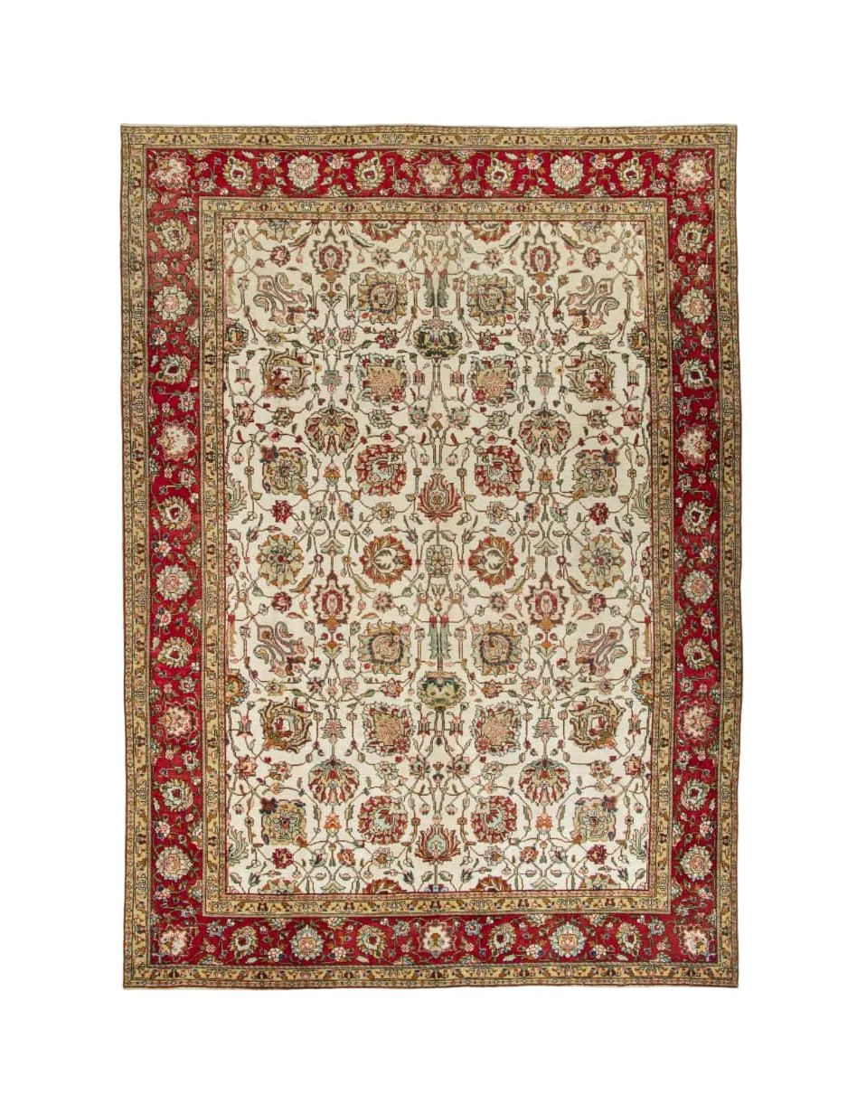 Persian Tabriz rug, full view with red border and beige medallion pattern