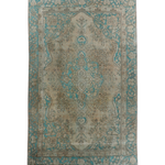 Persian Tabriz rug with beige center and teal border, ornate medallion pattern