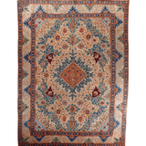 Persian Tabriz rug, symmetric floral medallion design in blue, teal, and rust tones