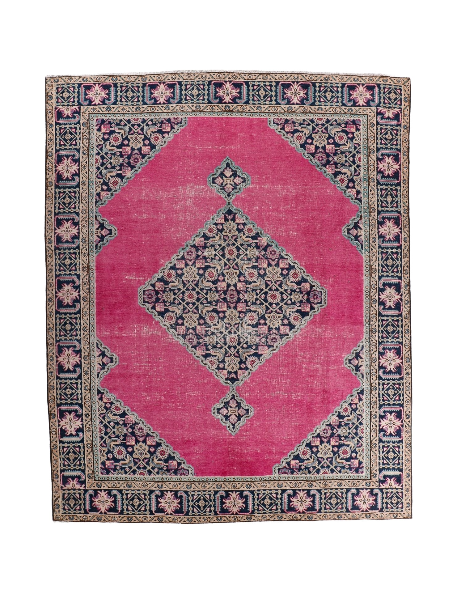 Persian Ardabil rug with pink field, navy border, and central geometric medallion