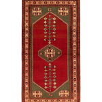 Rectangular Persian-style rug with red field, dark border, and geometric medallion motifs.