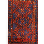 Persian Hamadan rug with red center medallion, navy corners, and patterned border
