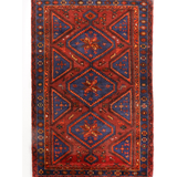 Persian Hamadan rug with red center medallion, navy corners, and patterned border