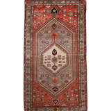 Whole red Persian Zanjan rug with central medallion and geometric border