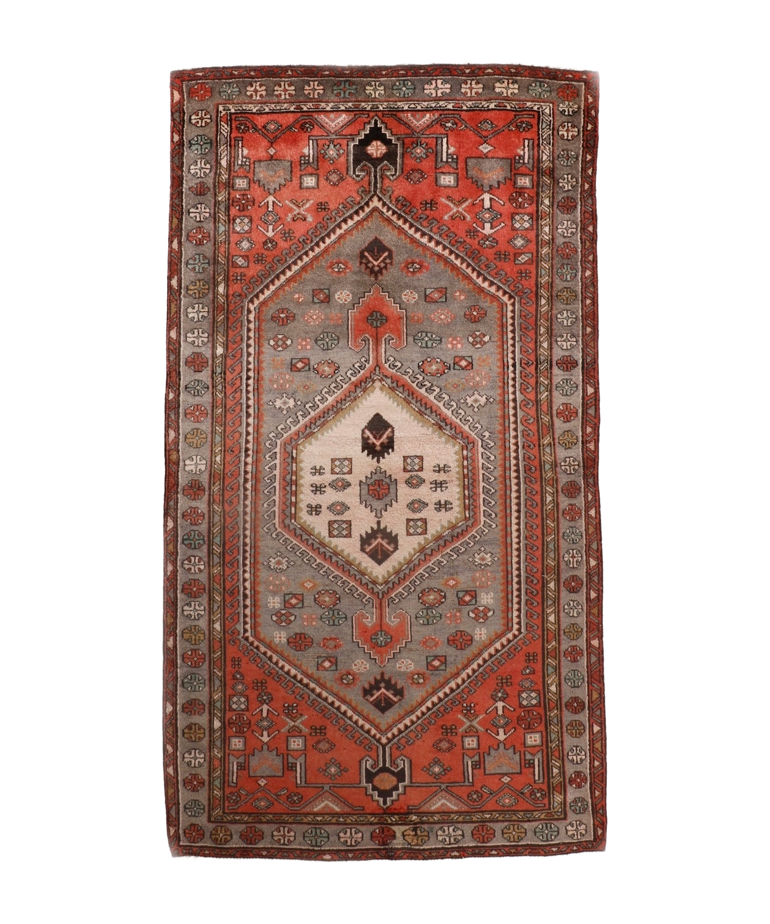 Whole red Persian Zanjan rug with central medallion and geometric border