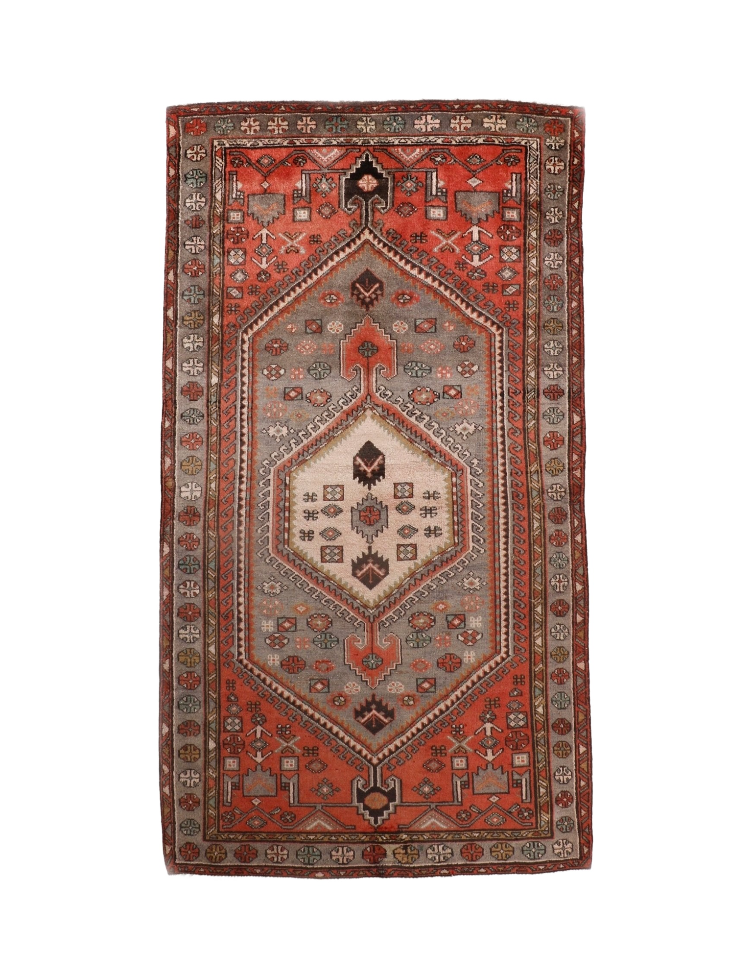 Whole red Persian Zanjan rug with central medallion and geometric border