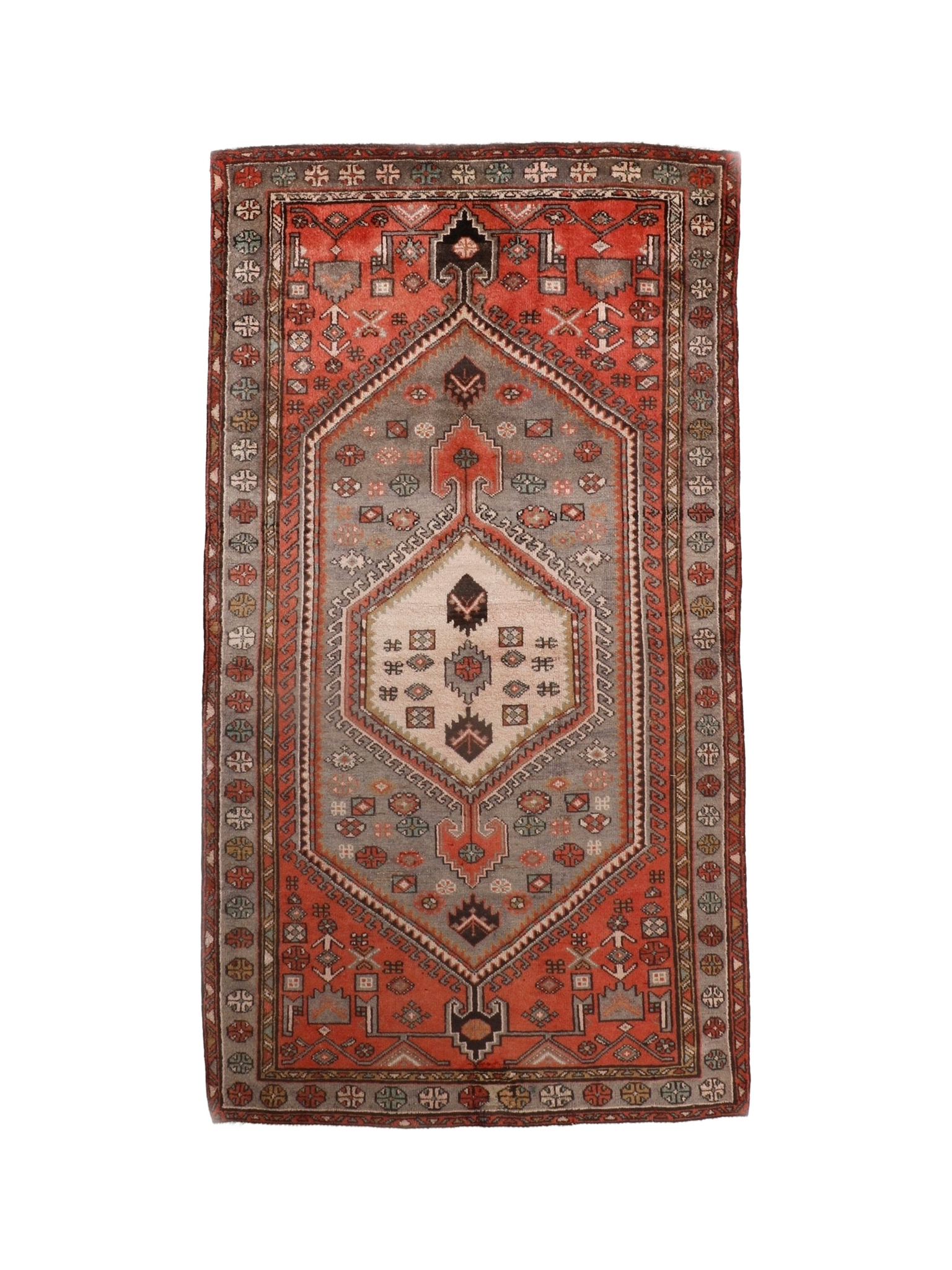 Whole red Persian Zanjan rug with central medallion and geometric border