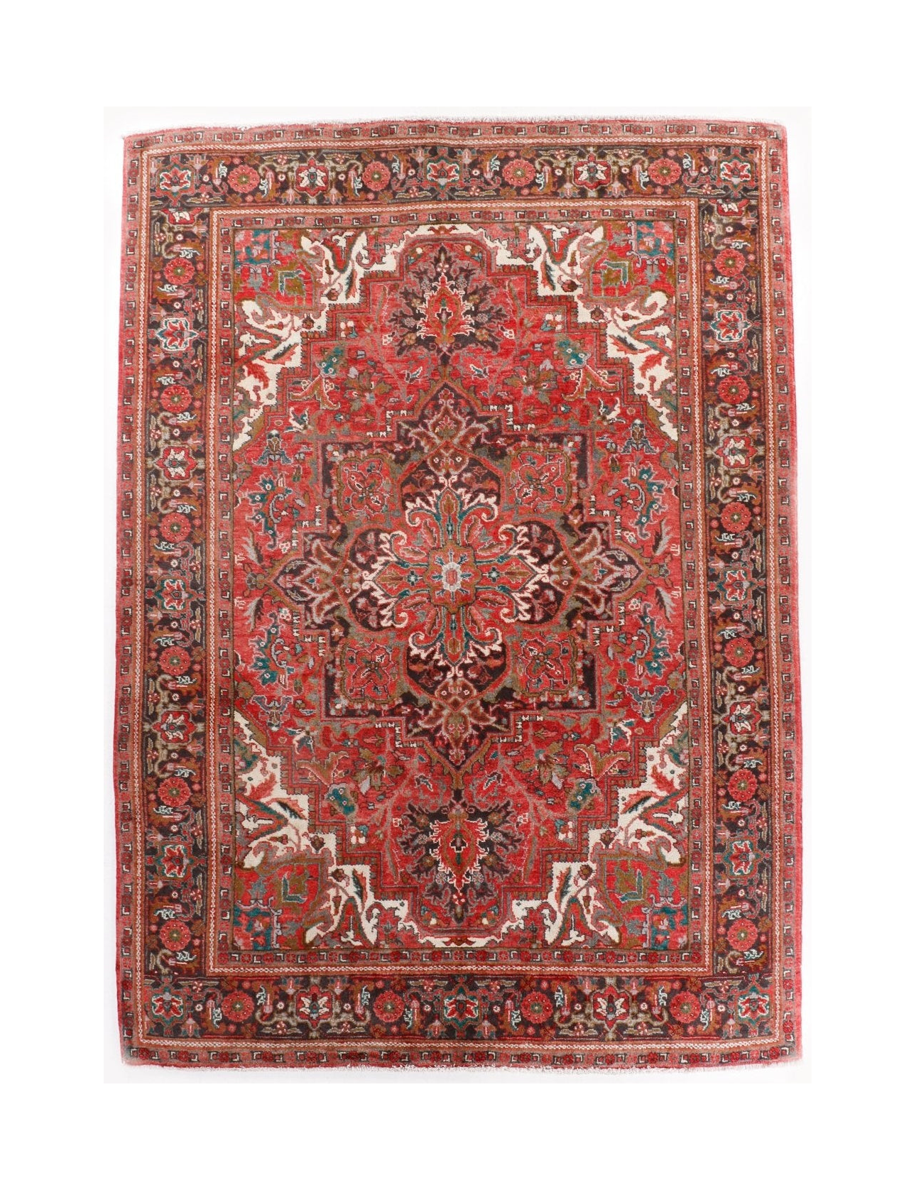 Persian Heriz rug with red medallion center, teal and cream details, ornate border.