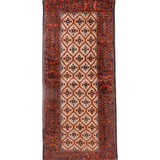 Persian rug with beige center medallions, terracotta border, navy and rust geometric motifs