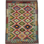 Rectangular kilim rug with repeating diamond medallions in red, teal, green, and yellow; fringed.