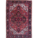 Persian Heriz rug with central crimson medallion, navy accents, and ornate border