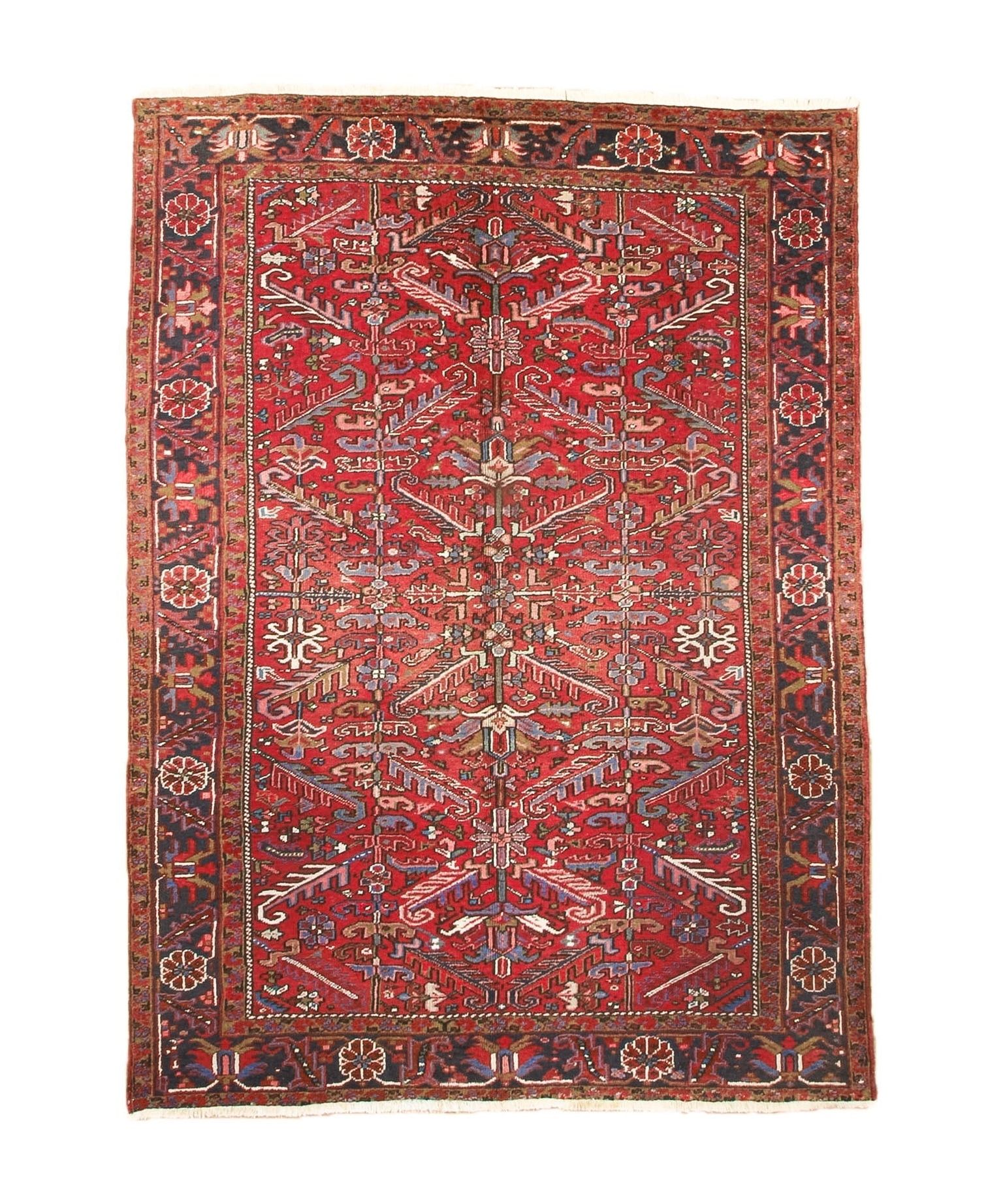 Red Persian-style Heriz rug with central medallion, ornate border, and cream accents