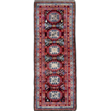 Semi-antique runner rug with red, blue and cream geometric medallion pattern