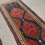 Antique Hashtroud Runner — Üç Göl (Three Pools) in Copper & Indigo. Additional original photograph showing the rug's surface, design and weave. SKU 1111.