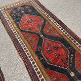Antique Hashtroud Runner — Üç Göl (Three Pools) in Copper & Indigo. Additional original photograph showing the rug's surface, design and weave. SKU 1111.