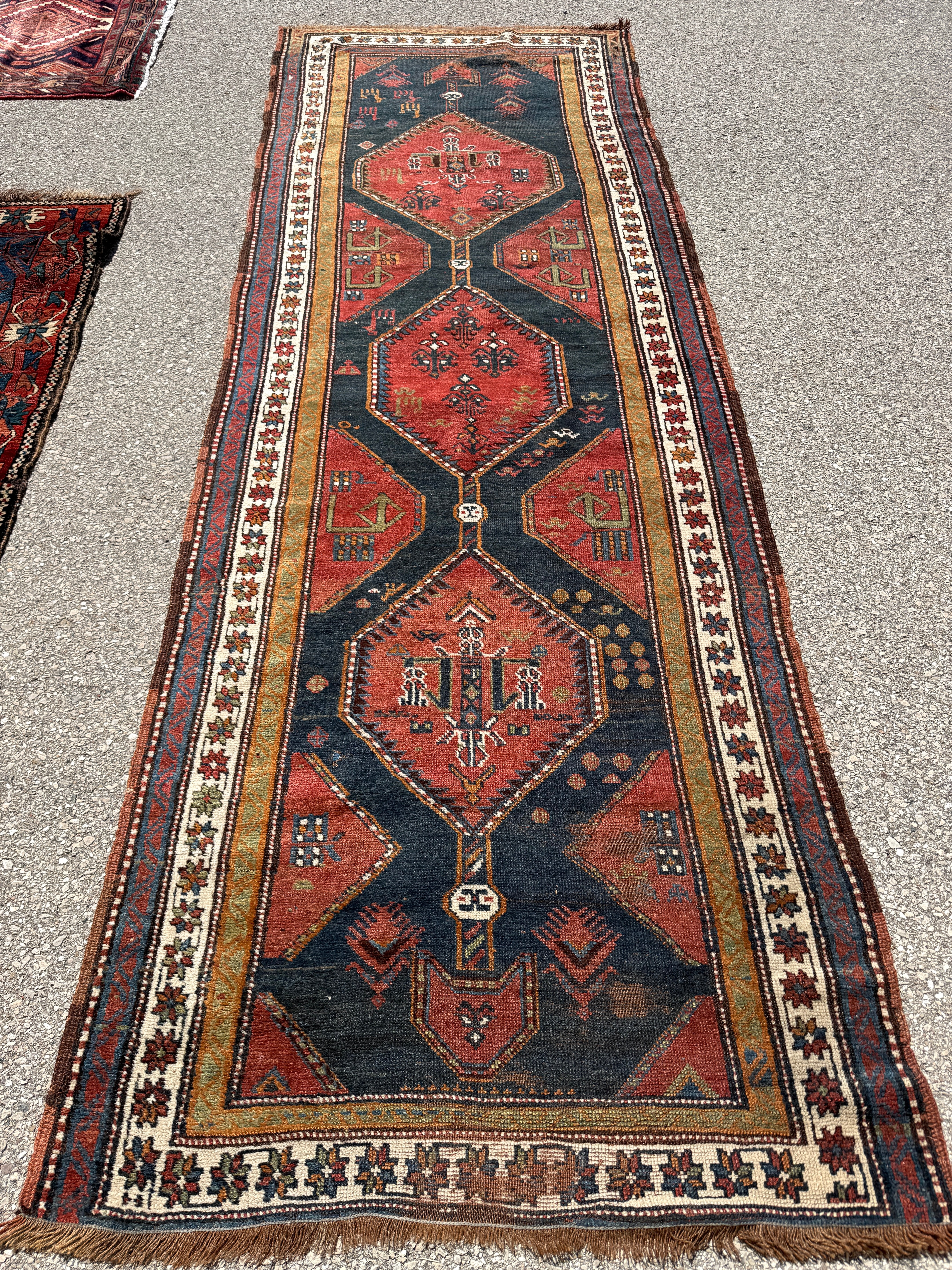 Antique Hashtroud Runner — Üç Göl (Three Pools) in Copper & Indigo. Additional original photograph showing the rug's surface, design and weave. SKU 1111.