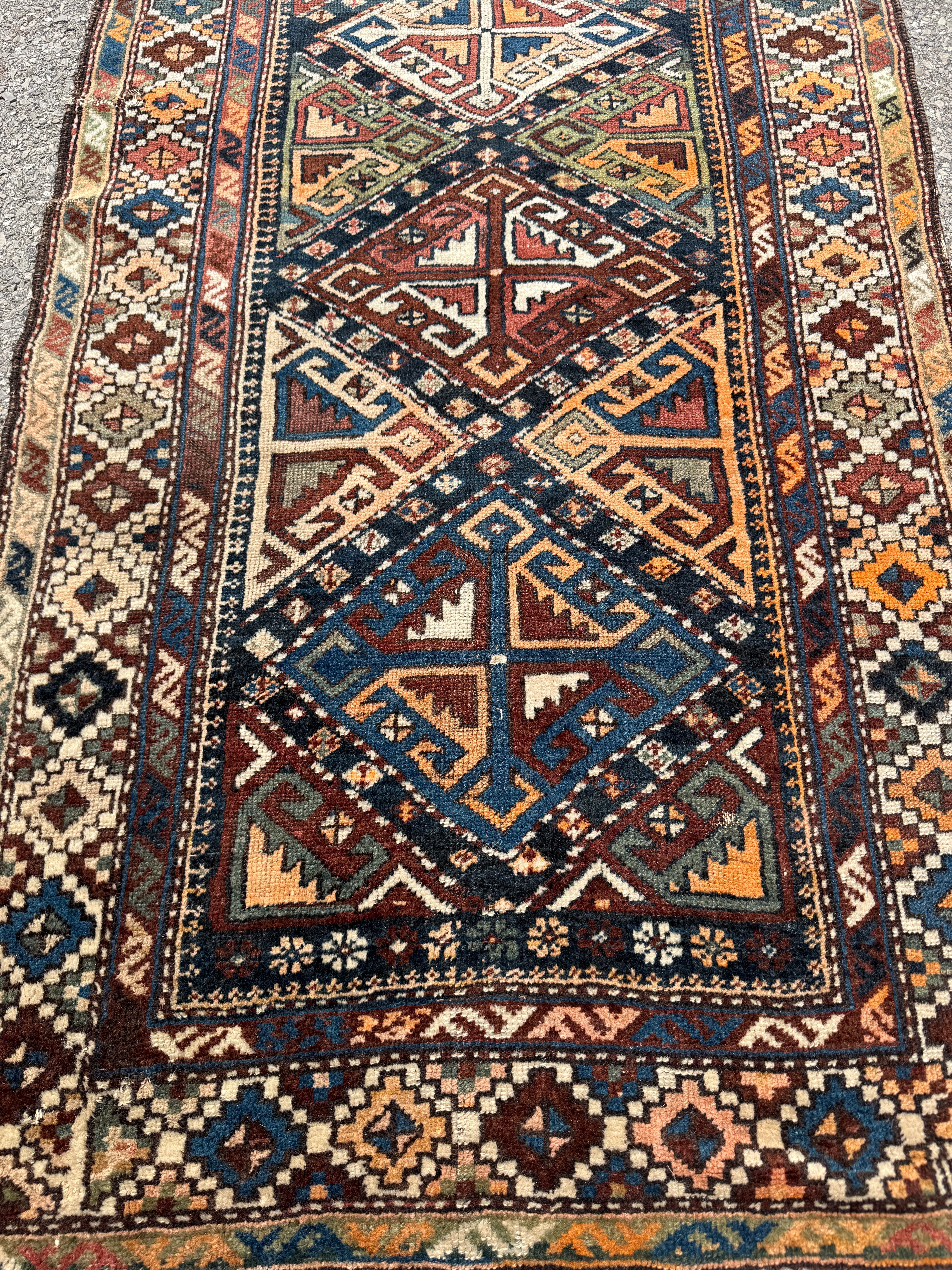 Antique Shahsavan Runner — Indigo & Saffron Tribal Geometry. Additional original photograph showing the rug's surface, design and weave. SKU 12407022.