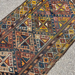 Antique Shahsavan Runner — Indigo & Saffron Tribal Geometry. Additional original photograph showing the rug's surface, design and weave. SKU 12407022.