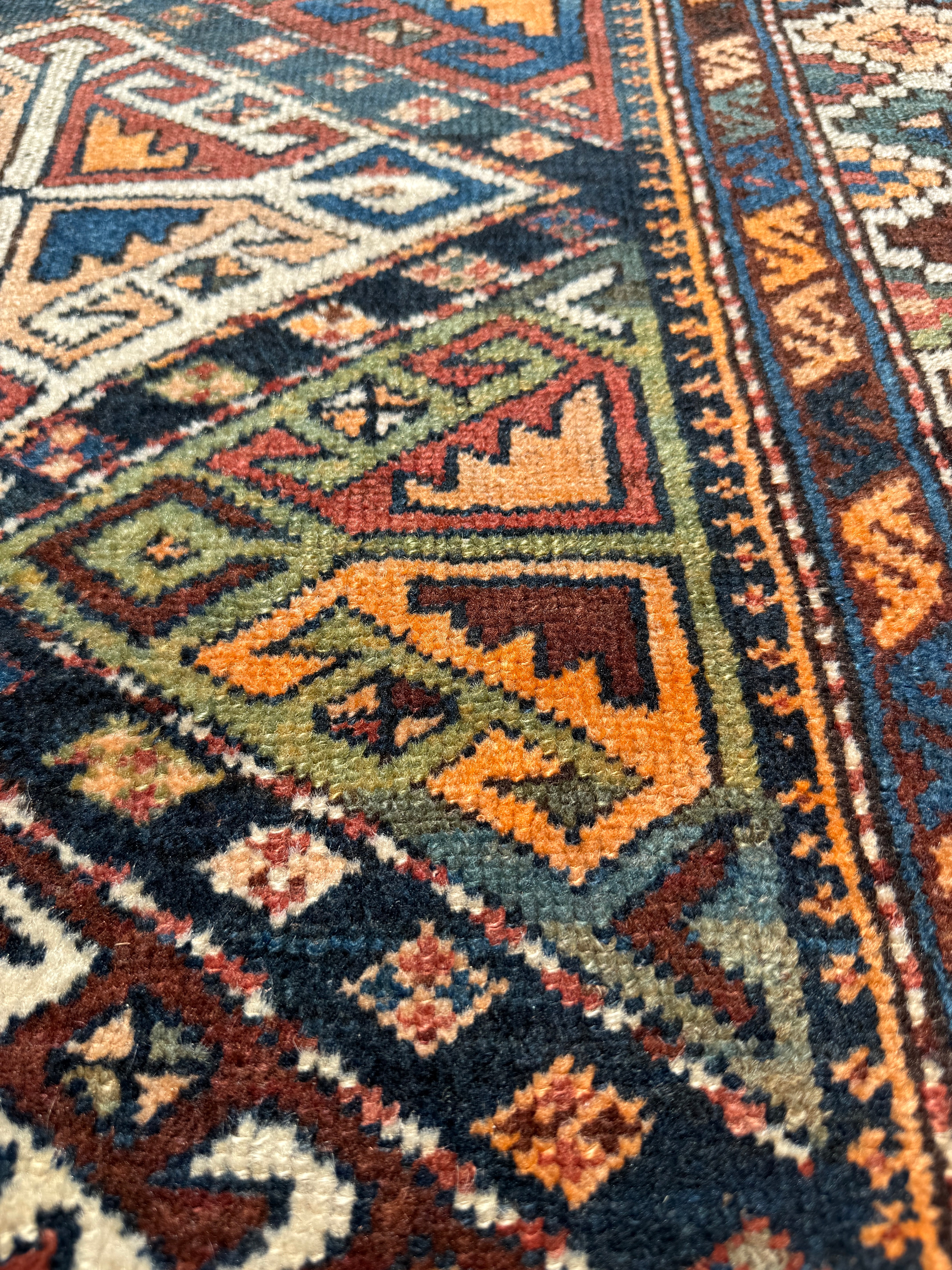Antique Shahsavan Runner — Indigo & Saffron Tribal Geometry. Additional original photograph showing the rug's surface, design and weave. SKU 12407022.