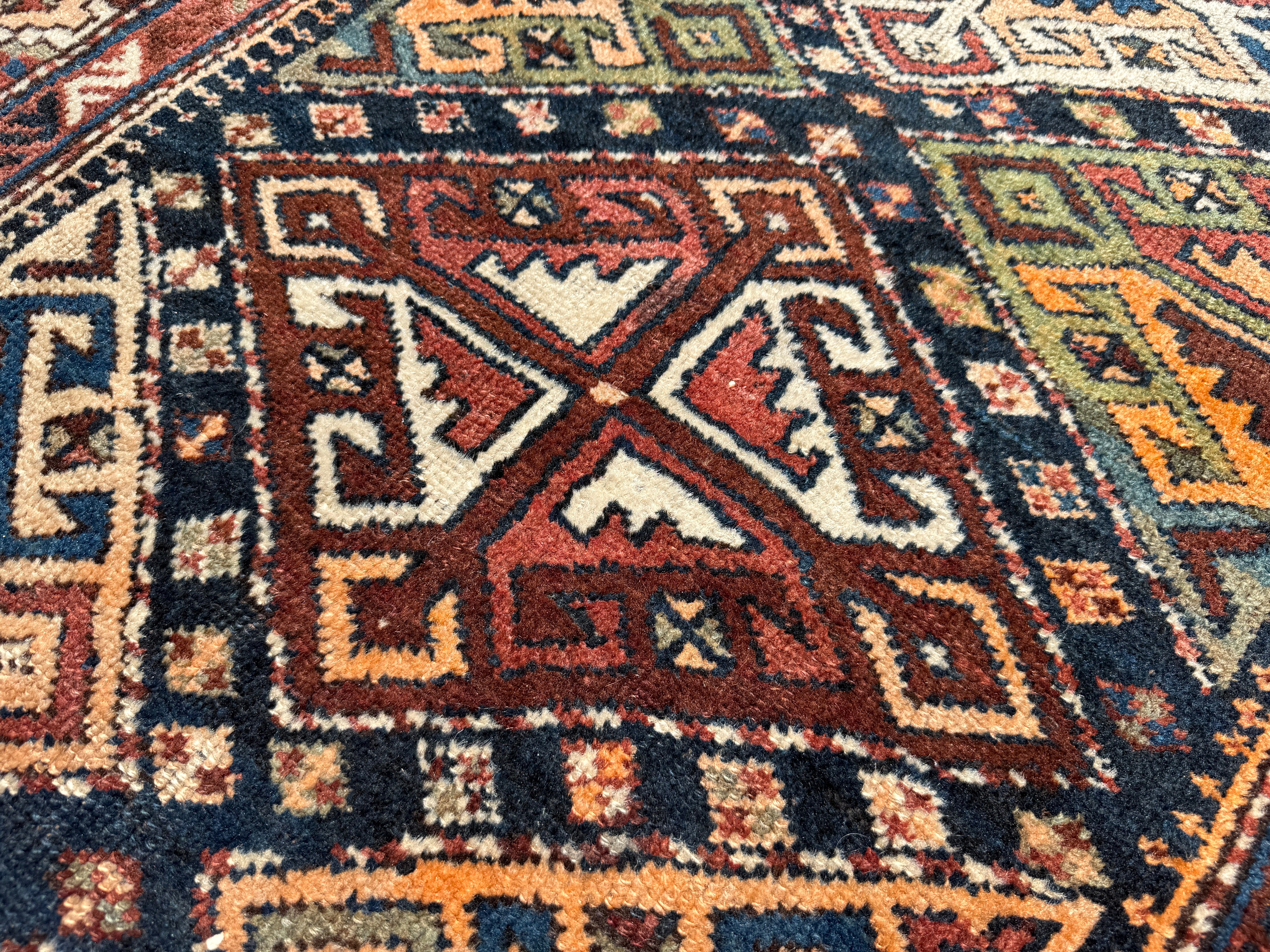 Antique Shahsavan Runner — Indigo & Saffron Tribal Geometry. Additional original photograph showing the rug's surface, design and weave. SKU 12407022.