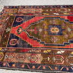 Vintage Turkish Yahyali Rug — Olive & Indigo Stepped Medallion. Additional original photograph showing the rug's surface, design and weave. SKU 12407024.