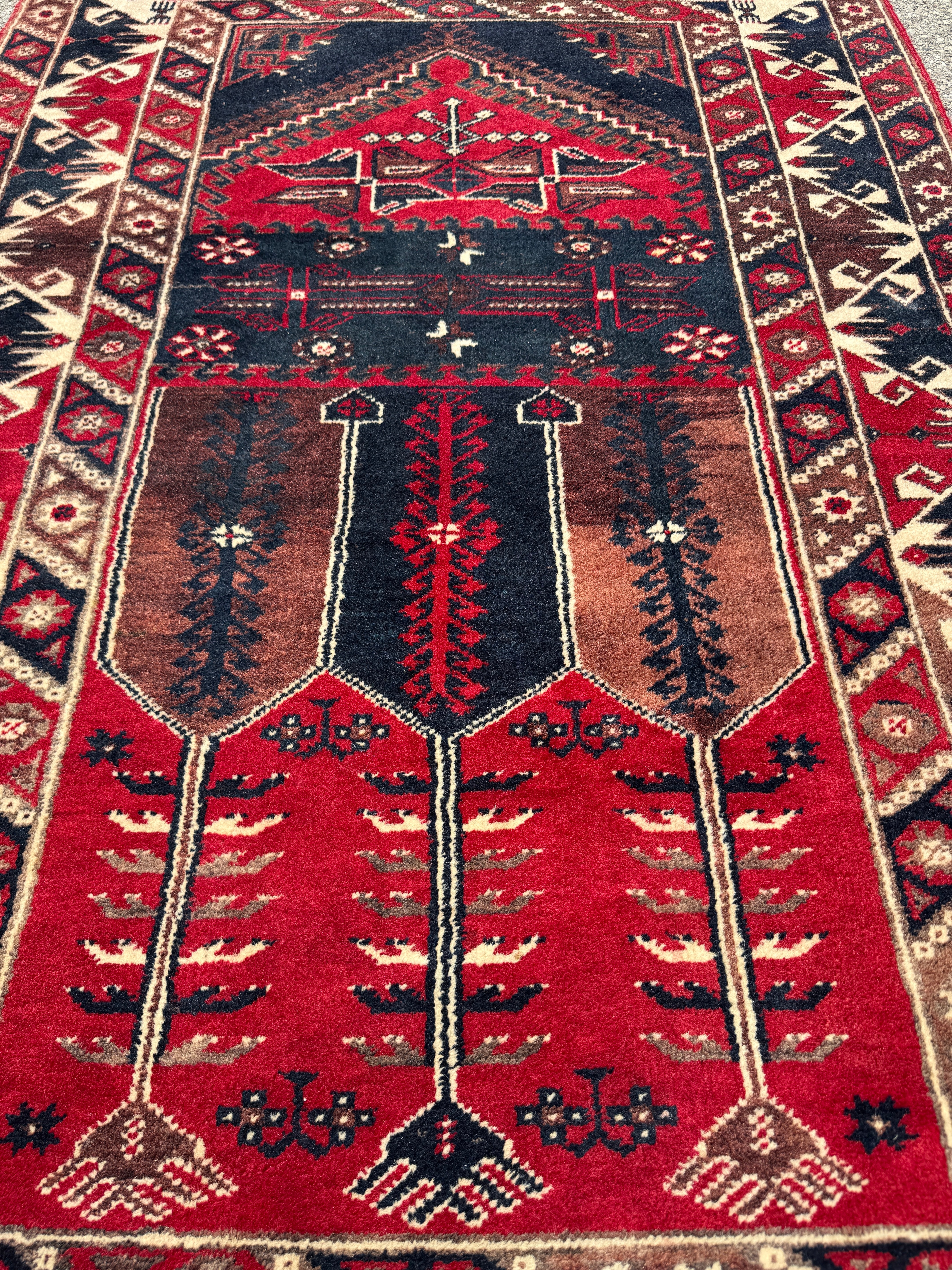Vintage Turkish Konya Rug — Ruby & Indigo Tree Motifs. Additional original photograph showing the rug's surface, design and weave. SKU 12407025.