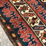 Vintage Kurdish Rug — Indigo & Coral Floral Medallion. Additional original photograph showing the rug's surface, design and weave. SKU 2050X.
