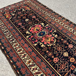 Vintage Kurdish Rug — Indigo & Coral Floral Medallion. Additional original photograph showing the rug's surface, design and weave. SKU 2050X.
